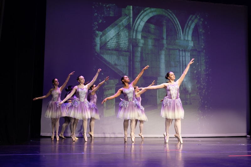 Ballerinas performing on stage.