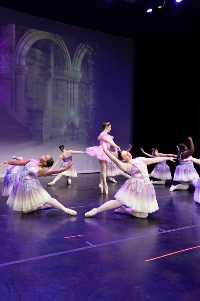 Ballerinas performing on stage.
