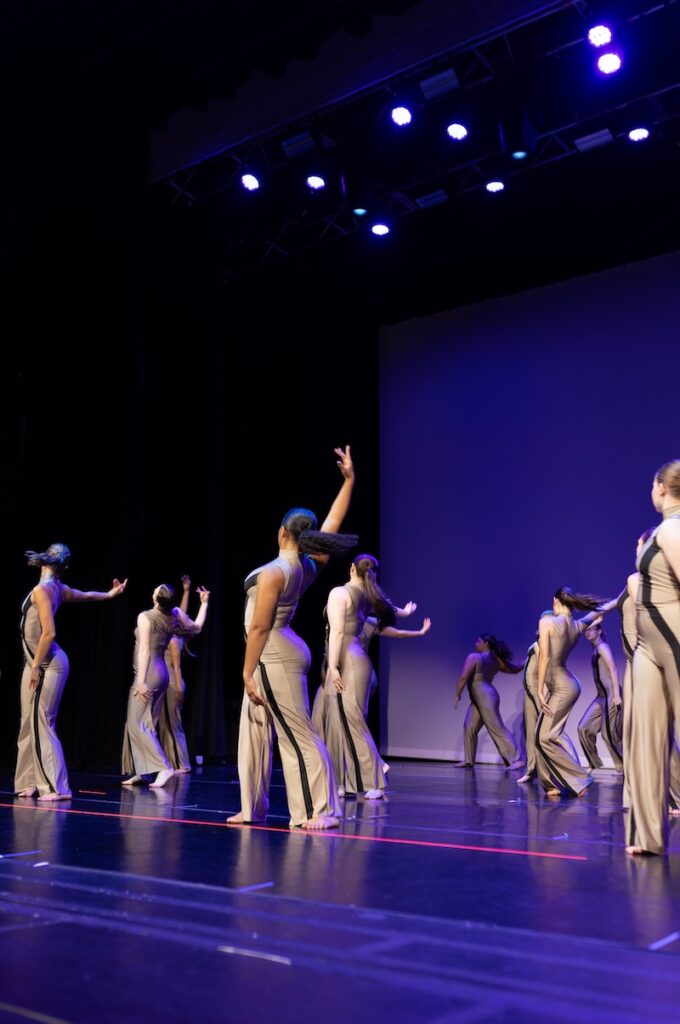 modern dancers performing on stage.