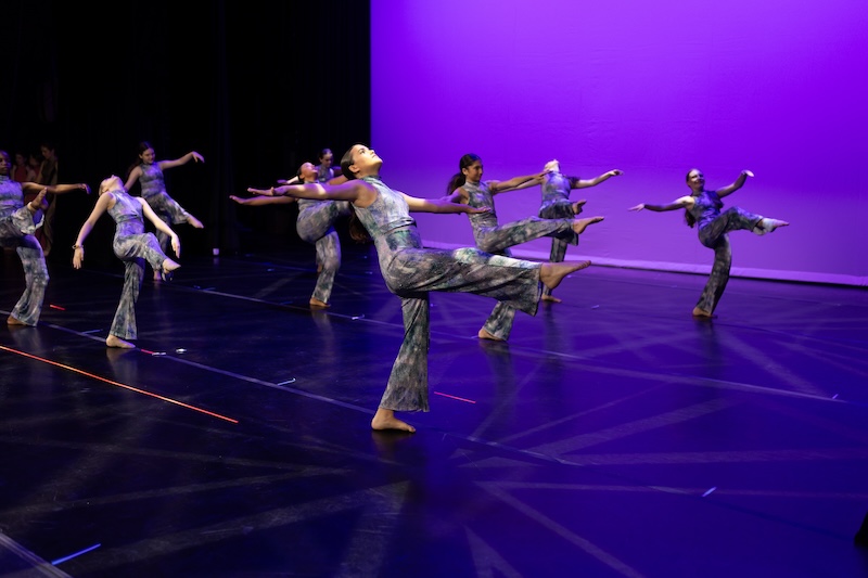 modern dancers performing on stage.