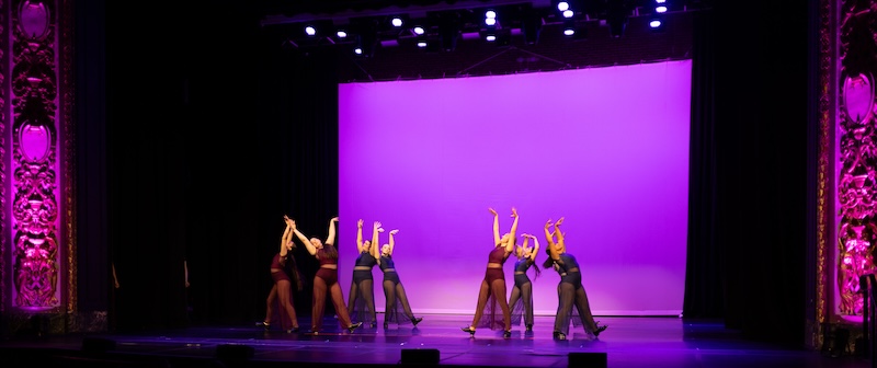 Tap dancers performing on stage.
