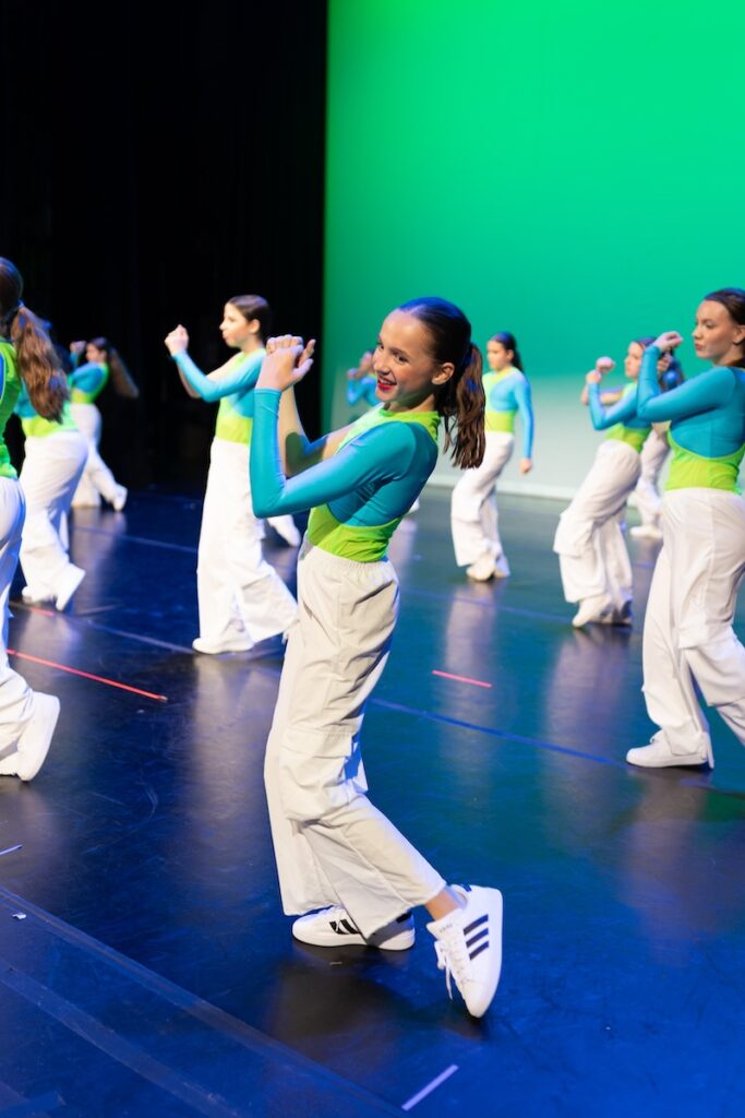 young hip hop dancers performing on stage.