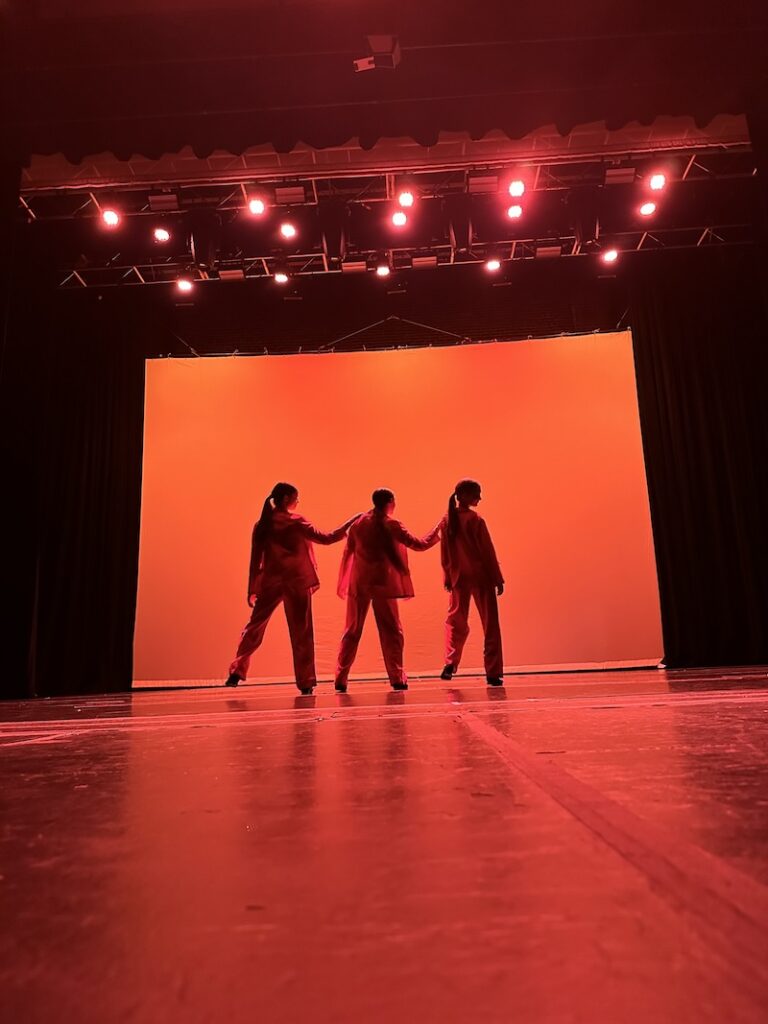 tap dancers on stage in costume
