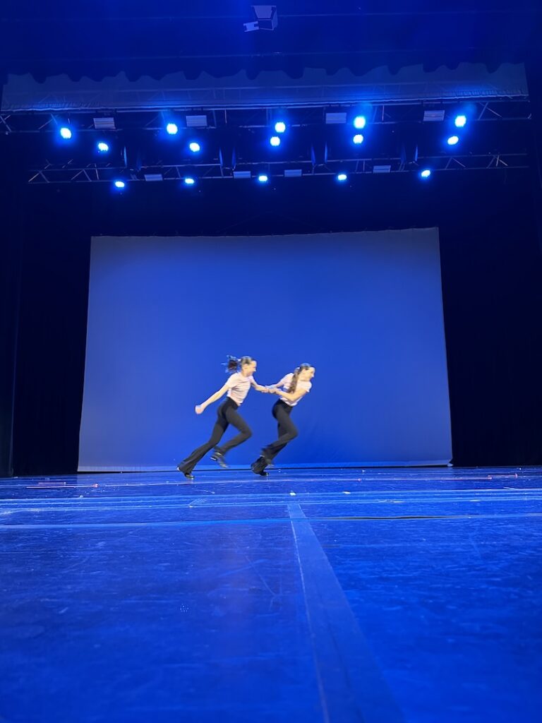 tap dancers, dancing on stage.